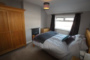 Bedroom One- click for photo gallery